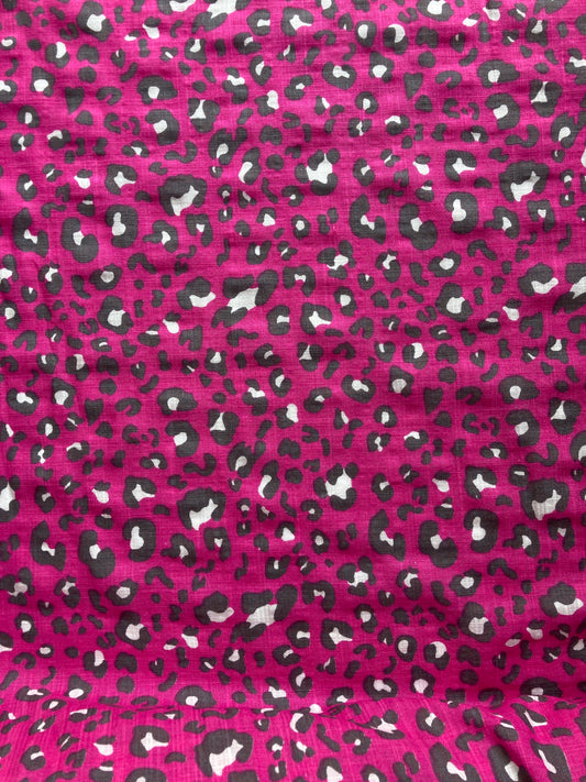 Linen look cerise pink leopard print fabric
