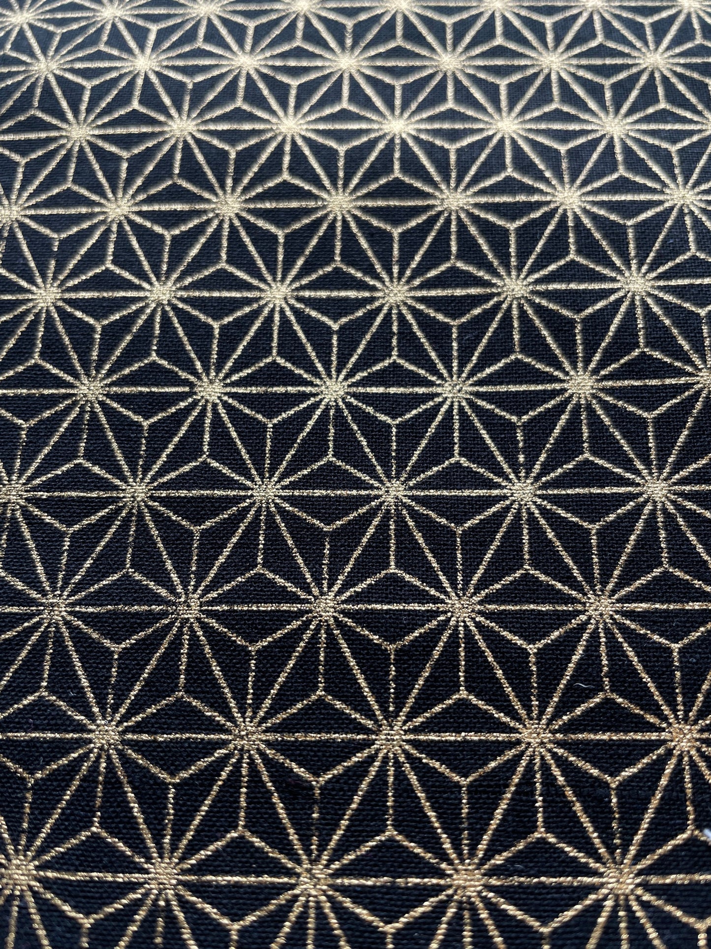 Geometric gold star cotton fabric