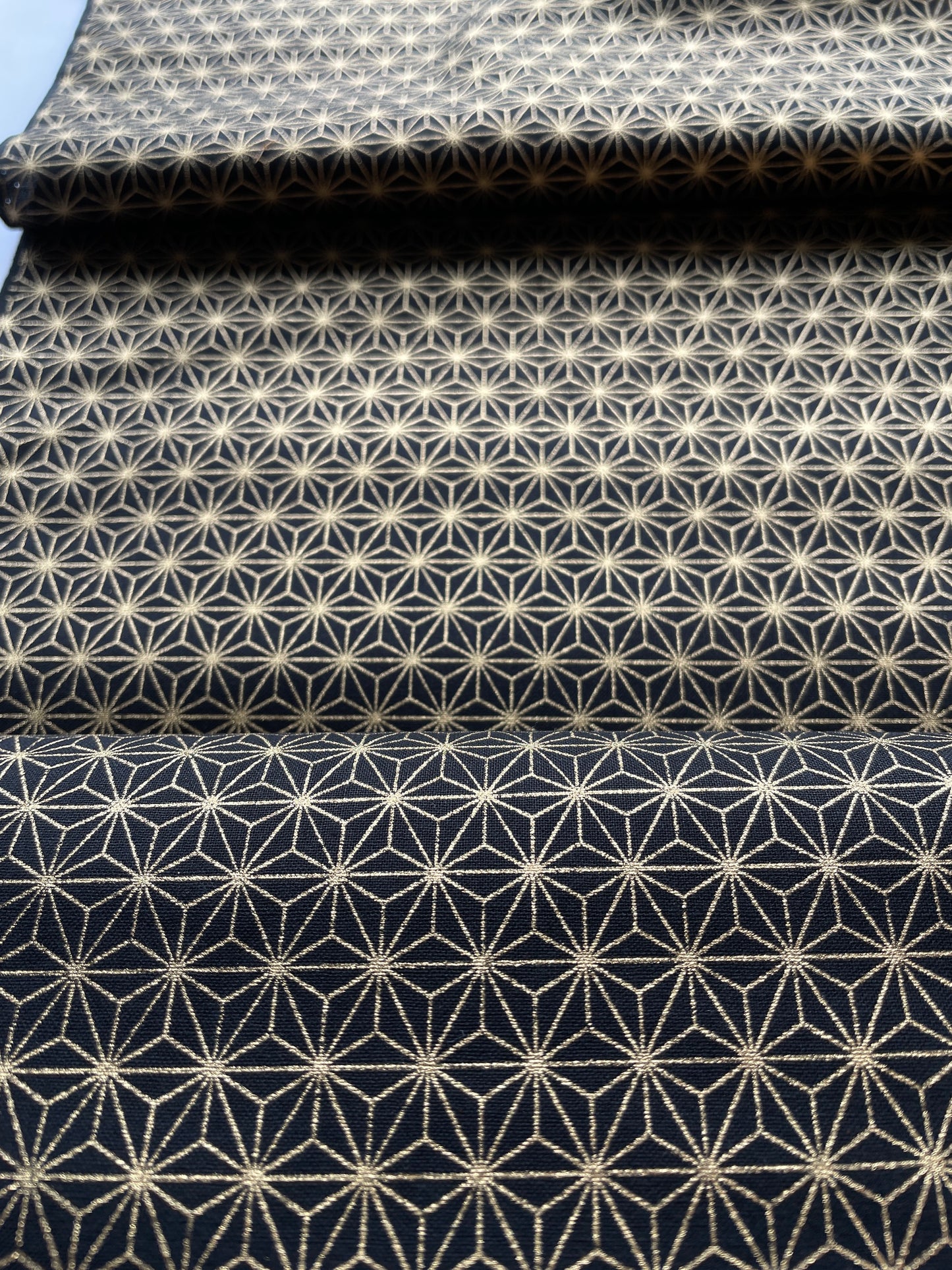 Geometric gold star cotton fabric