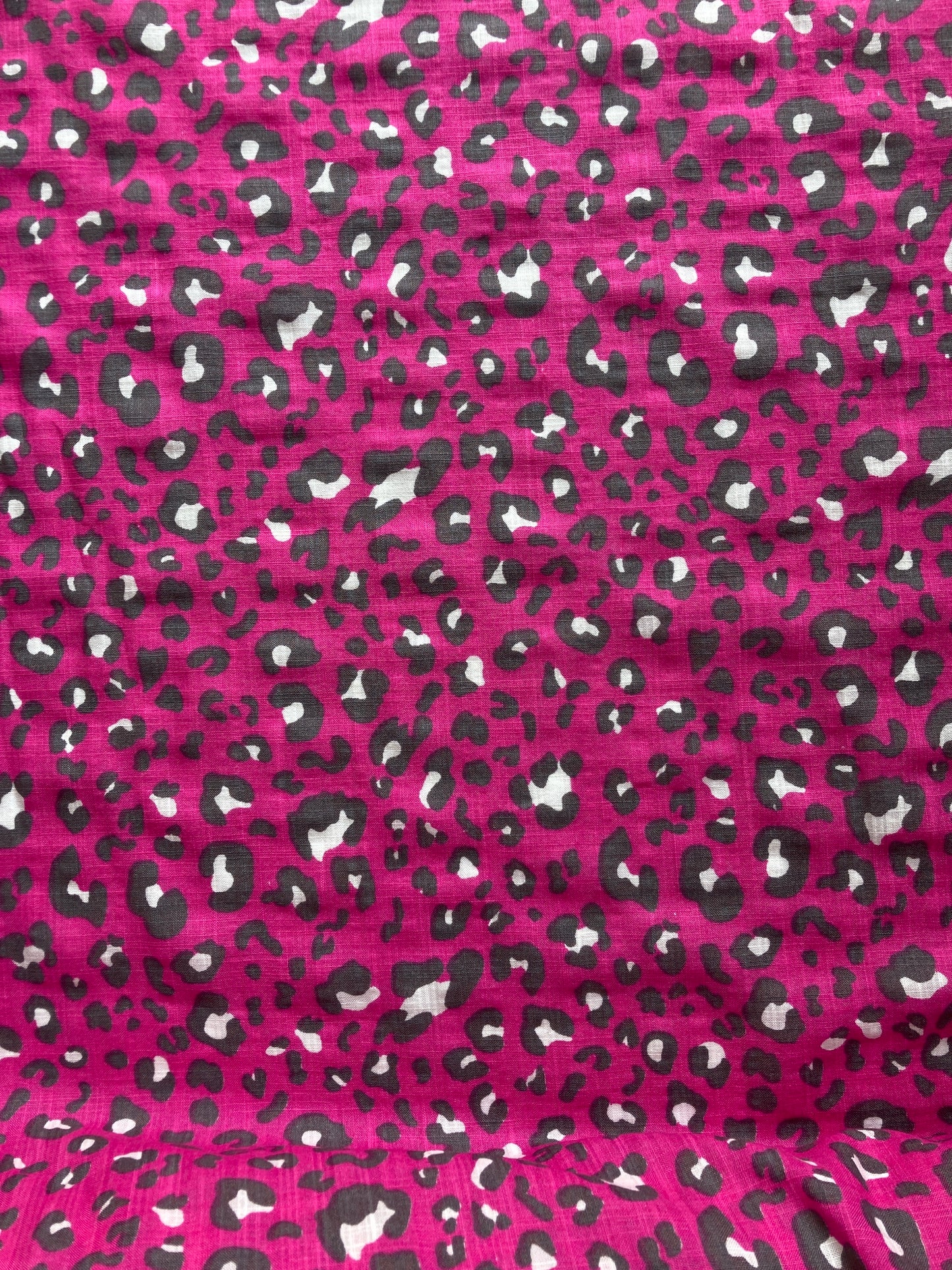 Linen look cerise pink leopard print fabric