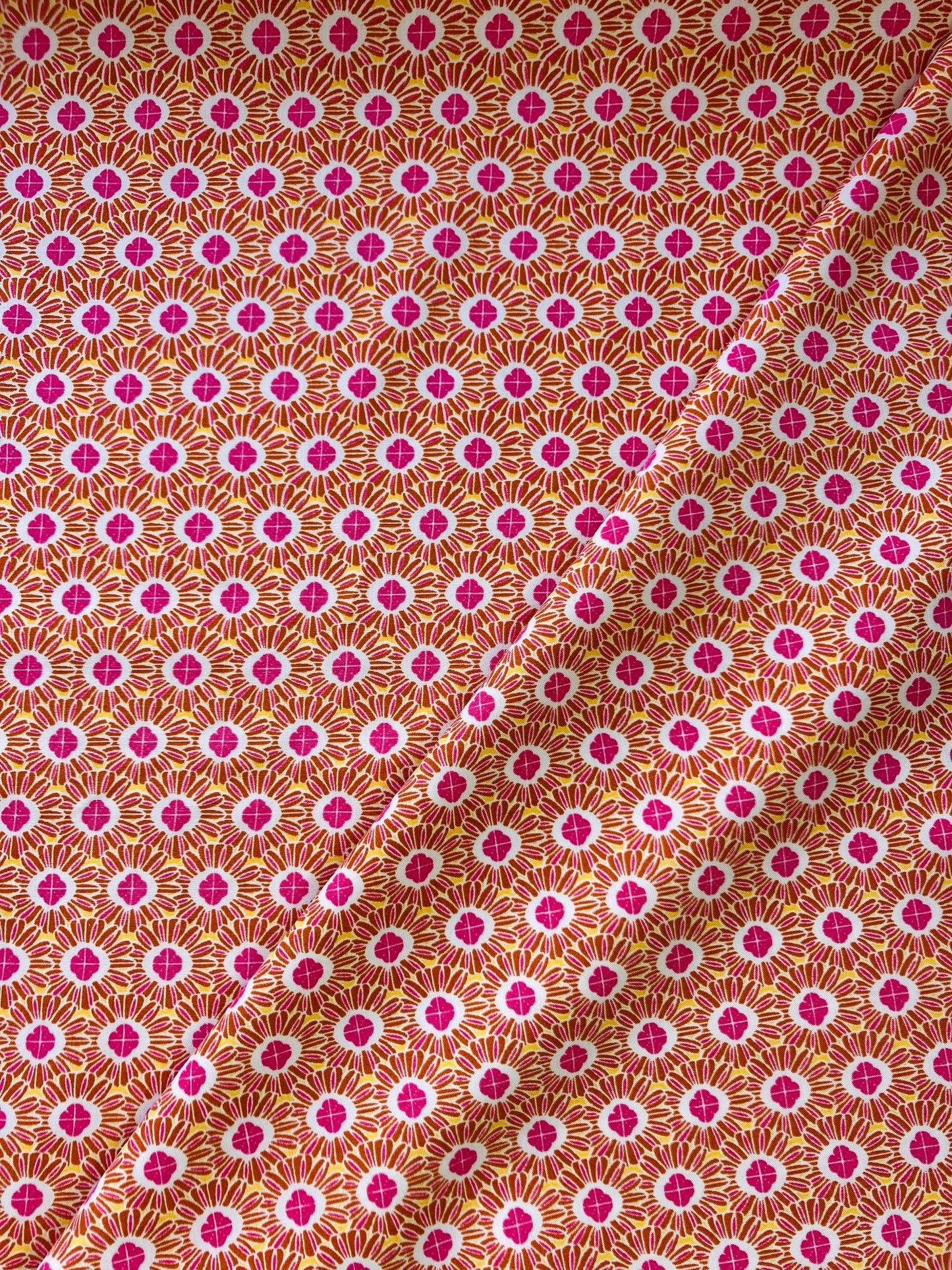 Orange and Pink Daisy fabric, from Mistral, in Rayon