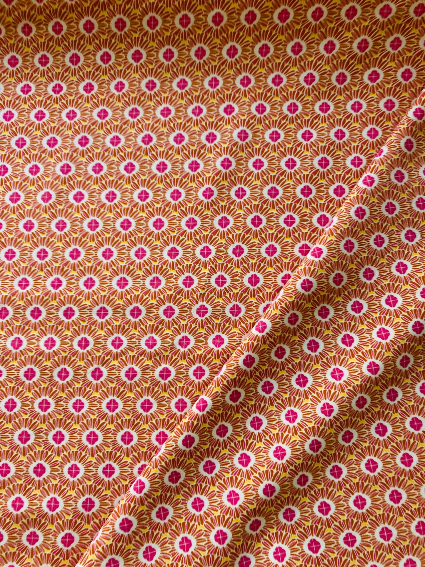 Orange and Pink Daisy fabric, from Mistral, in Rayon