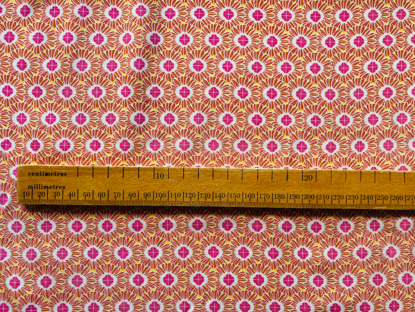 Orange and Pink Daisy fabric, from Mistral, in Rayon