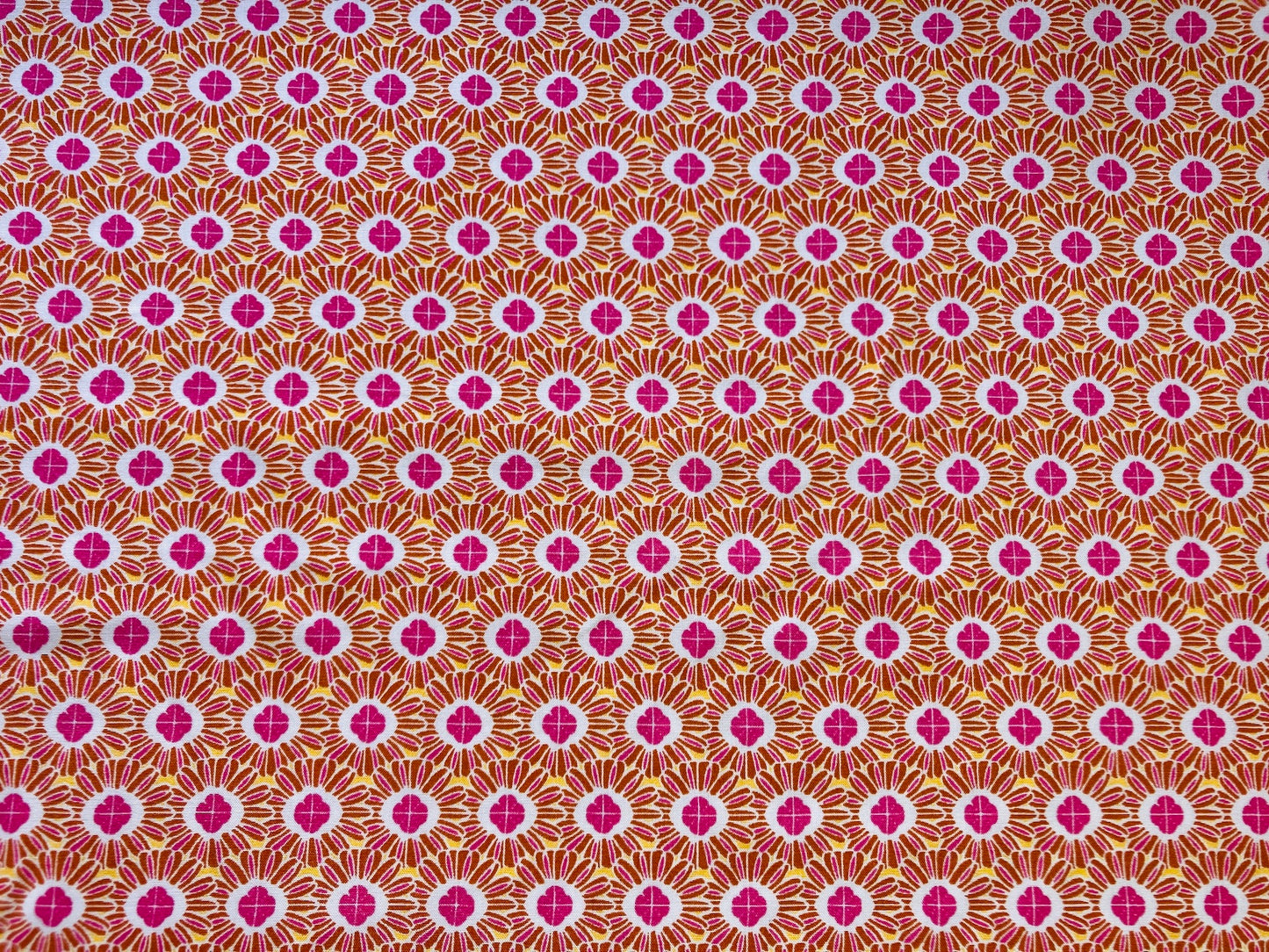 Orange and Pink Daisy fabric, from Mistral, in Rayon